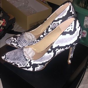 Brand new snake pattern high heels